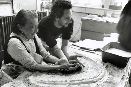 Louise Bourgeois and her assistant Jerry Gorovoy in her Brooklyn studio preparing to make a mold for a sculpture in 1995 