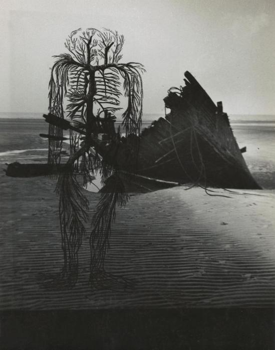 Josef Breitenbach-untitled , human circulatory system diagram, dark beach scene with wrecked boat,  1942  © The Josef Breitenbach Trust
