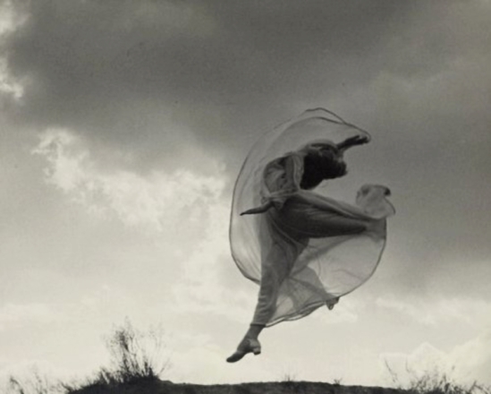 Franz Fiedler- the dancer sarah jankelow jumping in front of clouds, 1926