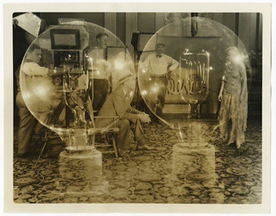 “Electrical illusion of director Jack Conway, filming a scene of Bessie Love, Metro-Goldwyn-Mayer dancing and singing star.” 19301