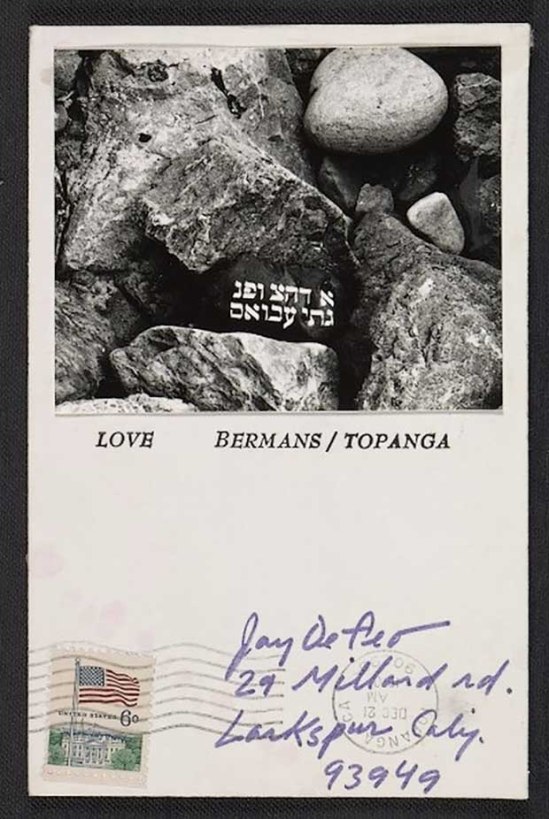 Wallace Berman- mail art for Wallace Berman holiday card to Jay DeFeo, 1970 Dec. 22.,Card features a black and white photo of rocks with white lettering in Hebrew Archives of American Art,