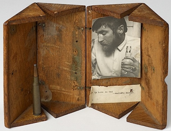 Wallace BermanUntitled (Art is Love is God), 1955, Robert Alexander. Wooden box, photograph, bullet, and paper ourtesy of Galerie Frank Elbaz and Michael Kohn Gallery.