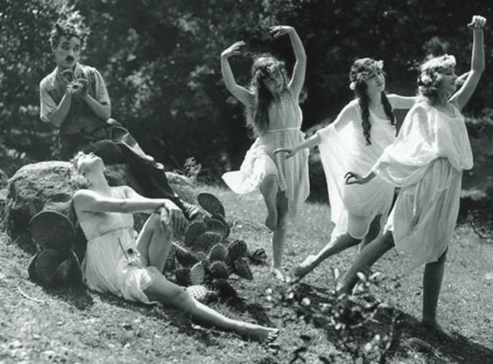 Charlie Chaplin with Olive Ann Alcorn, Edna Purviance, Willie Mae Carson, & Helen Kohn as ‘The Nymphs’ in Sunnyside,1919