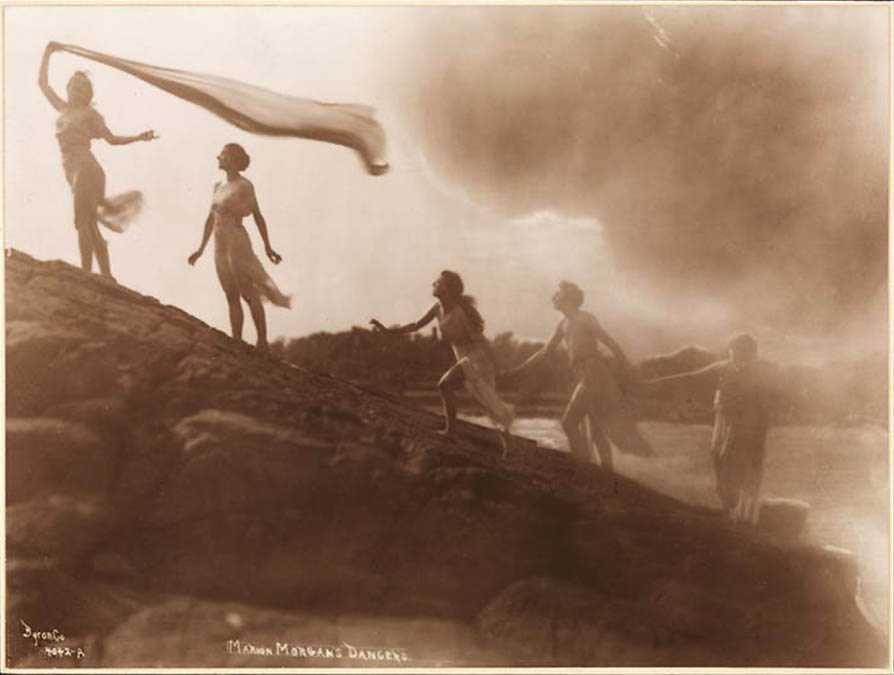 Byron Company - Marion Morgan's dancers posing on rocks at the beach Rye, New York, 1920